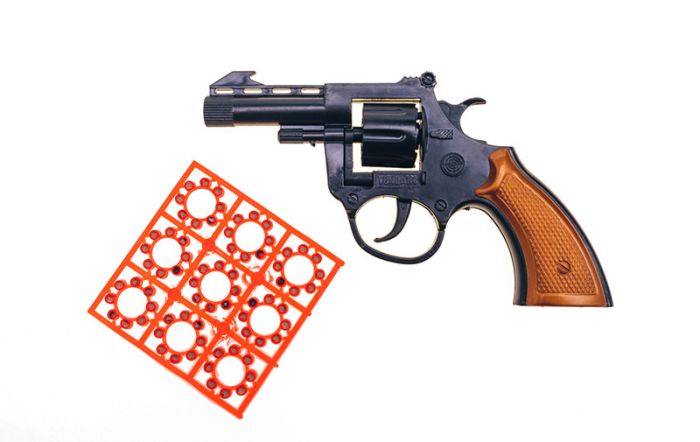 Іграшковий револьвер "Кольт" Golden Gun 110 / 120GG з пістонами